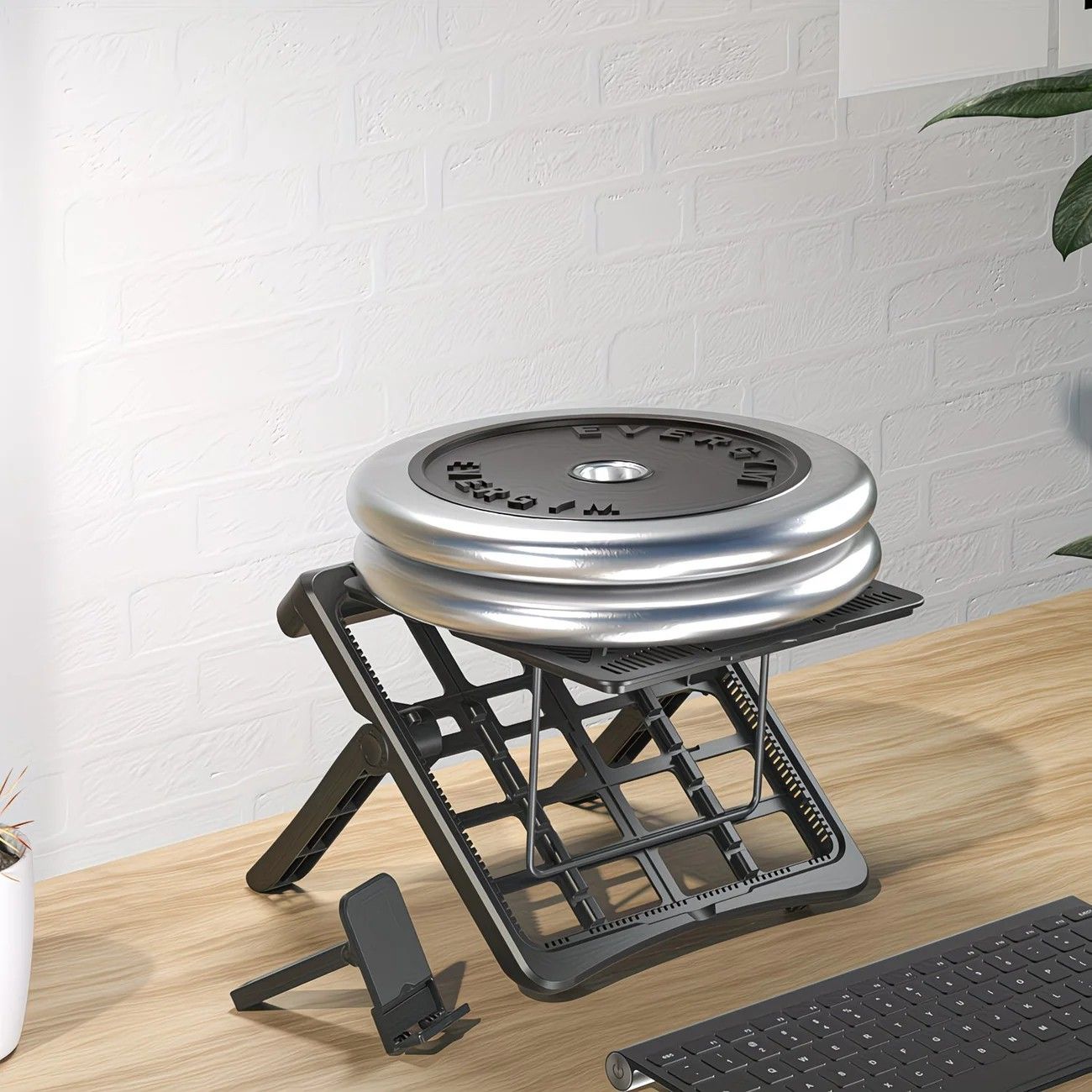 Adjustable laptop stand, designed for 17.3-inch laptops, a portable stand that allows for height adjustment on the desk, and comes with a dedicated phone holder.