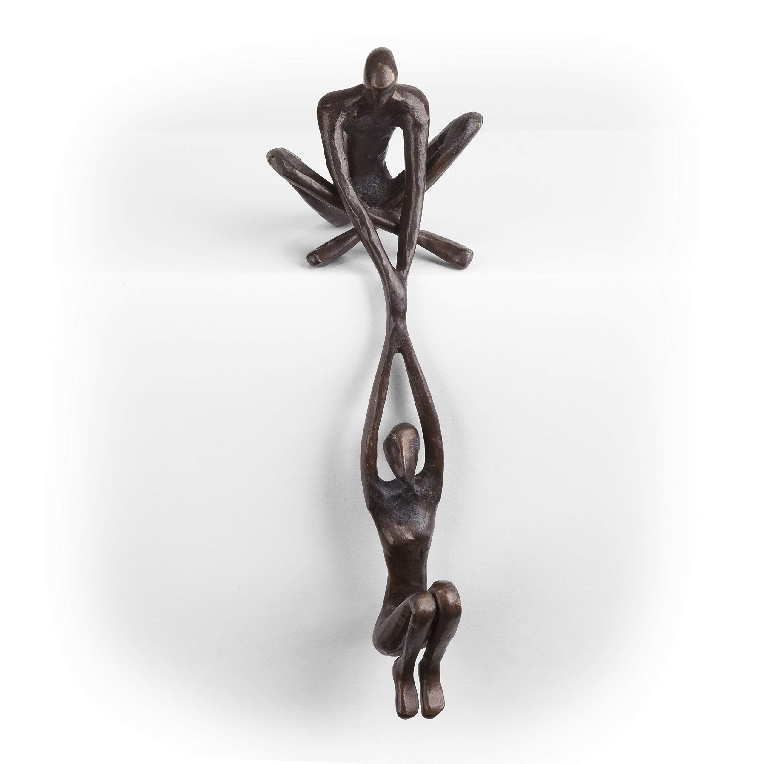 Contemporary Metal Shelf Décor - Bronze Sculpture - Man Lifting Woman from Ledge Handcrafted using the sand casting method